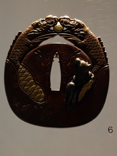 Katana Tsuba Depicting a Fox in Buddhist Robes Katana Tsuba Depicting a Fox in Buddhist Robes