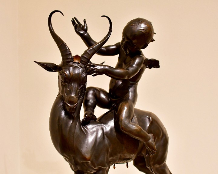 Curved Horns and Winged Child