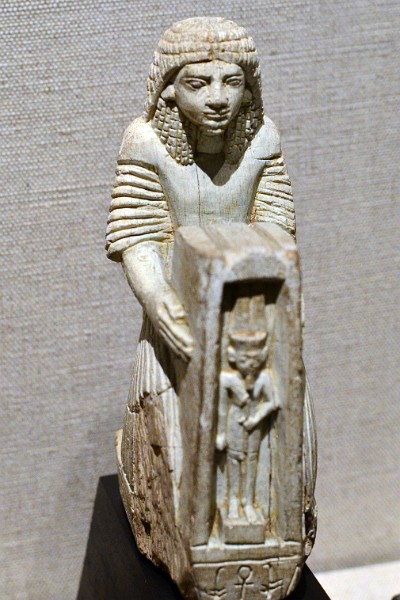 Userhat Holding a Shrine of Amen From the Egyptian New Kingdom Time Period Userhat Holding a Shrine of Amen From the Egyptian New Kingdom Time Period