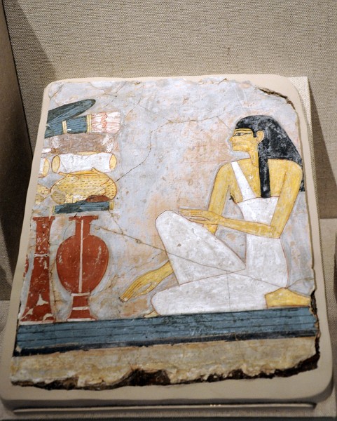 Woman Kneeling Before a Table of Offerings From 1450 BC Woman Kneeling Before a Table of Offerings From 1450 BC
