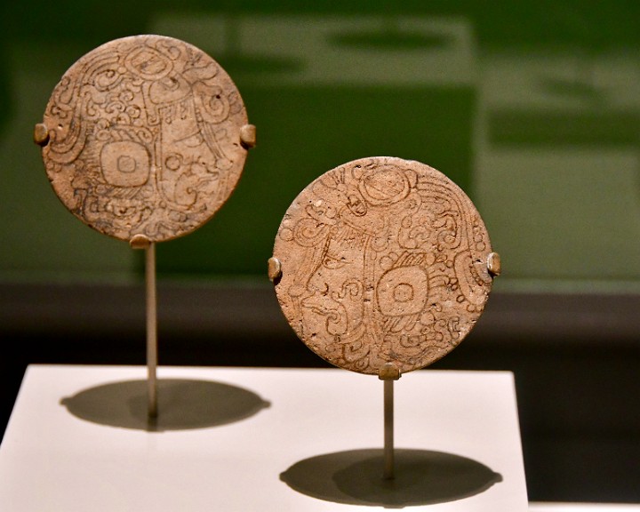 Earflares With Deity Heads in Profile From the Maya Culture. Dated 400 - 850 CE