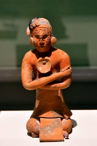 Seated Nobleman Ocarina With Facial Scarification From the Maya Culture. Dated 550 - 850 CE