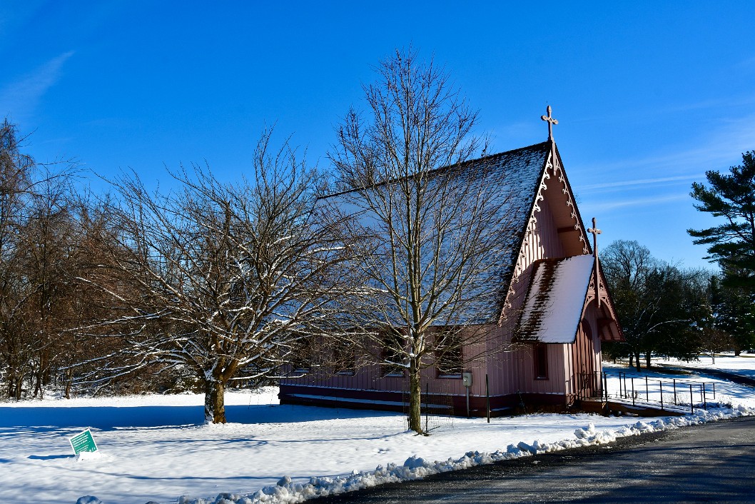 Bare Trees and a Snowy Chapel