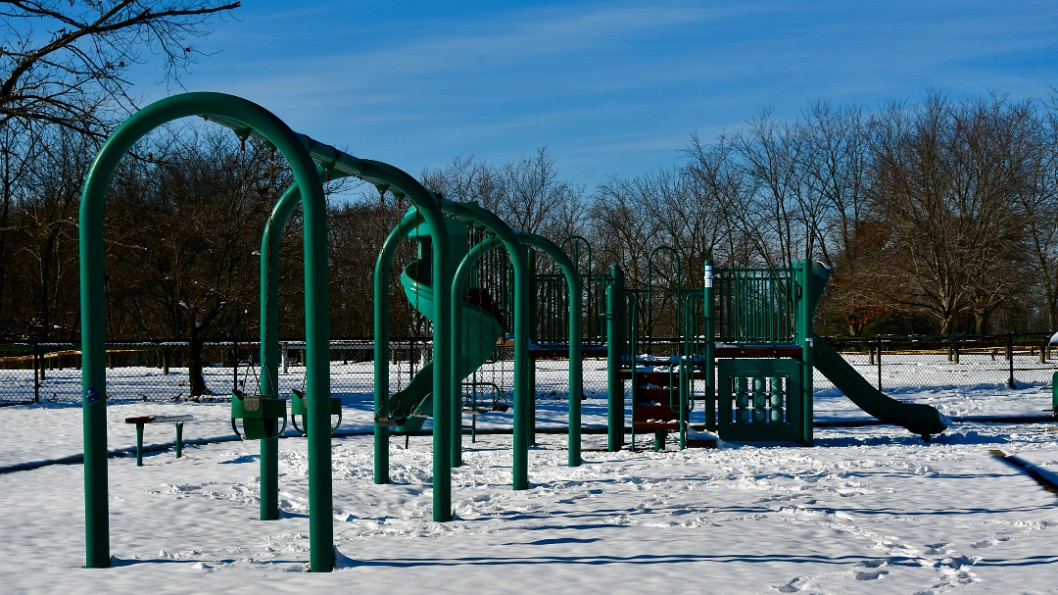 Silent Playground on a Snowy Day